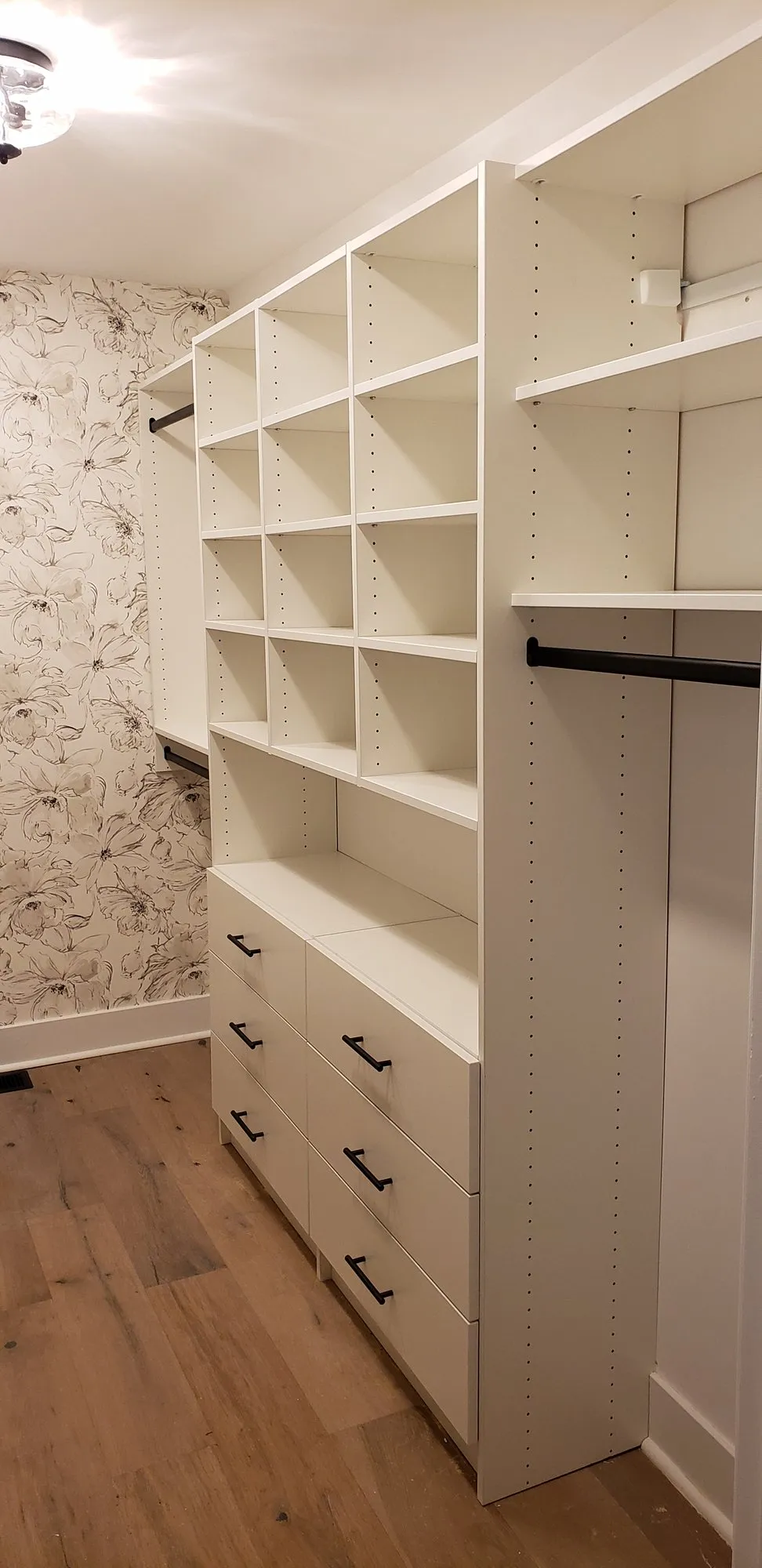 White walk in drawers, a custom closet built by Closet Authority NC in the Wilmington, NC area