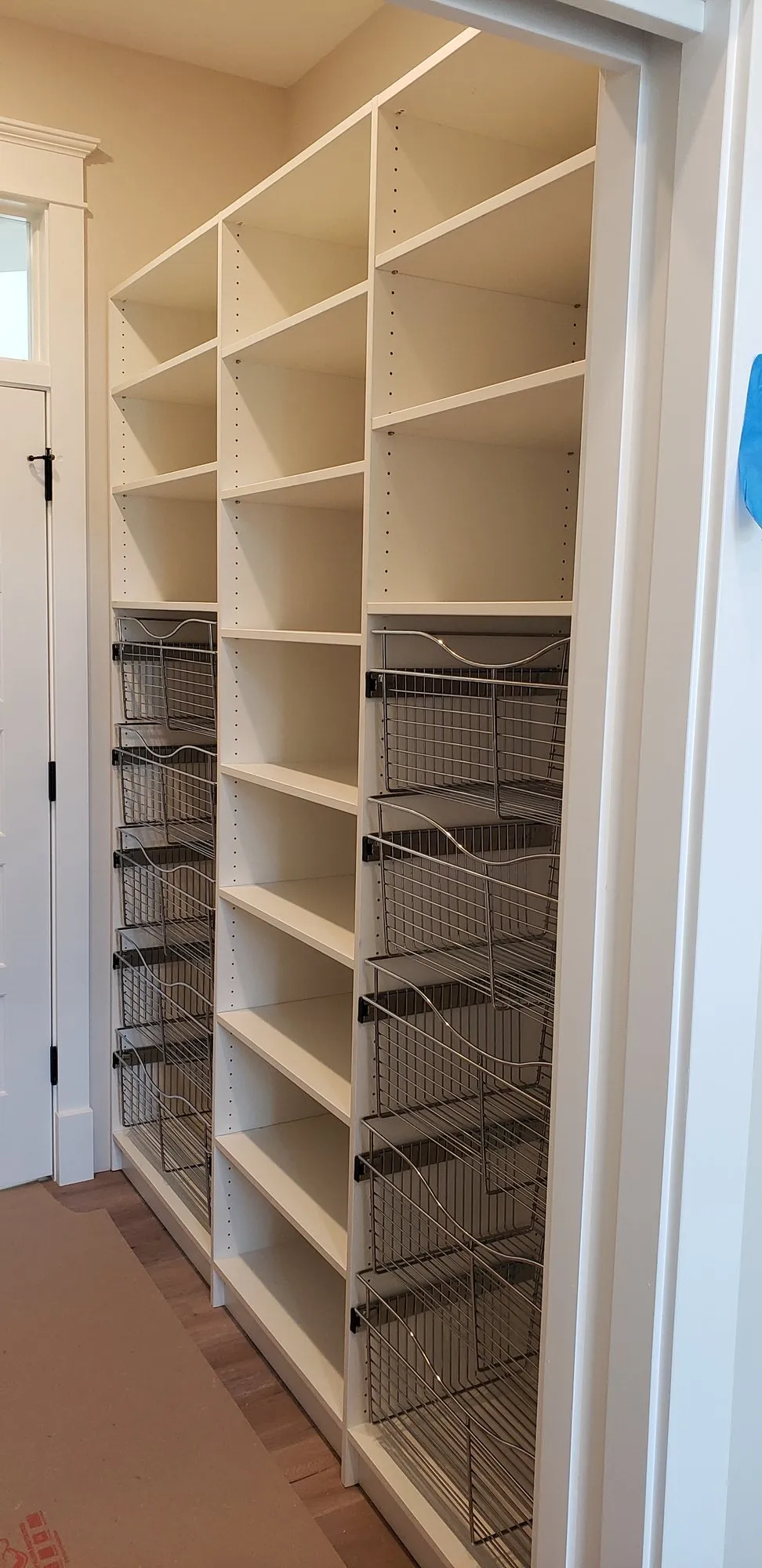 White wire basket closet, a custom closet built by Closet Authority NC in the Wilmington, NC area